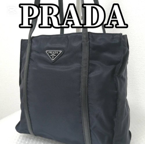Prada triangle logo - prada,